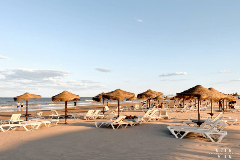 Beach umbrellas and sun lounges on Playa de Patacona