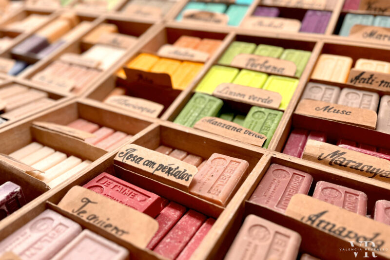 Colorful handmade soaps in wooden boxes