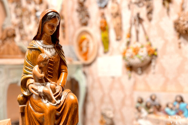 Wooden sculpture of Mary holding baby Jesus
